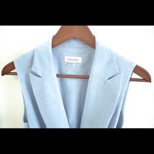 Blue sleeveless wrap dress